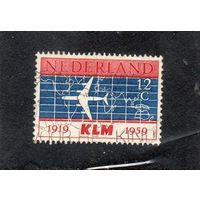 Нидерланды. Mi:NL 737. Силуэт авиалайнера Douglas DC-8 и карта мира. 40 лет KLM (Королевские голландские авиалинии) .1959