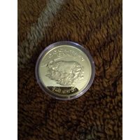 Монета носорог