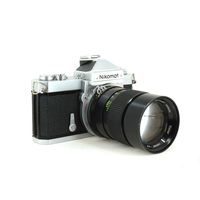 Фотоаппарат Nikon Nokomat FT с объективом Vivitar 2.8/135