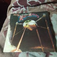 "War and Worlds" LP. Made in Holland.