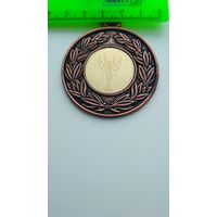 Спортивная медаль по борьбе самбо.