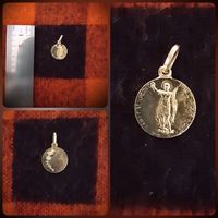 Католический медальон с изображением Святого Экспедита, покровителя командировочных.