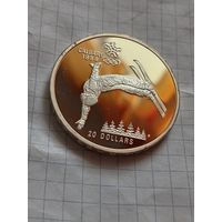 20 долларов 1986 года. Олимпийские игры в Калгари. Фристайл. Унция серебра в чистоте металла.
