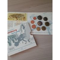Люксембург 2005 год. 1, 2, 5, 10, 20, 50 евроцентов, 1, 2 евро и 2 евро юбилейные 2005 года . Набор монет в BU буклете.